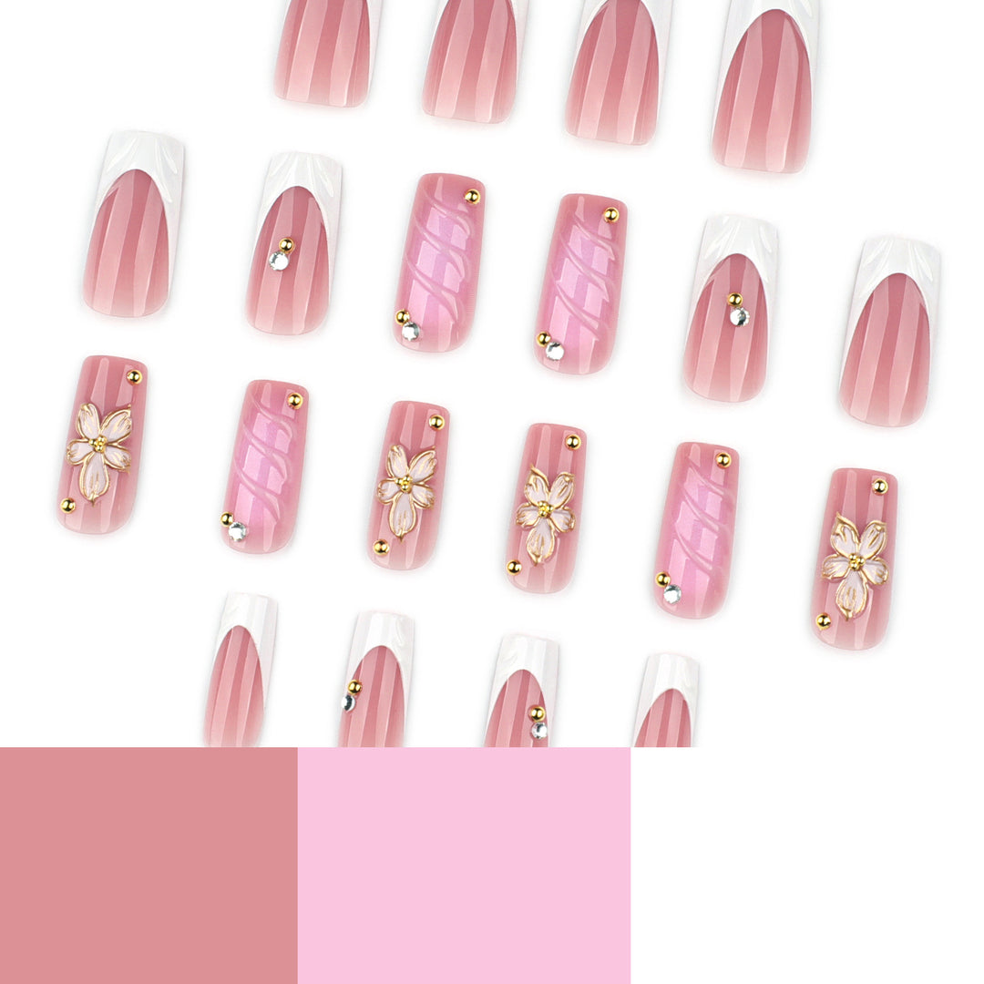 Glamorous gel nails with floral accent and glitter details Kalsten