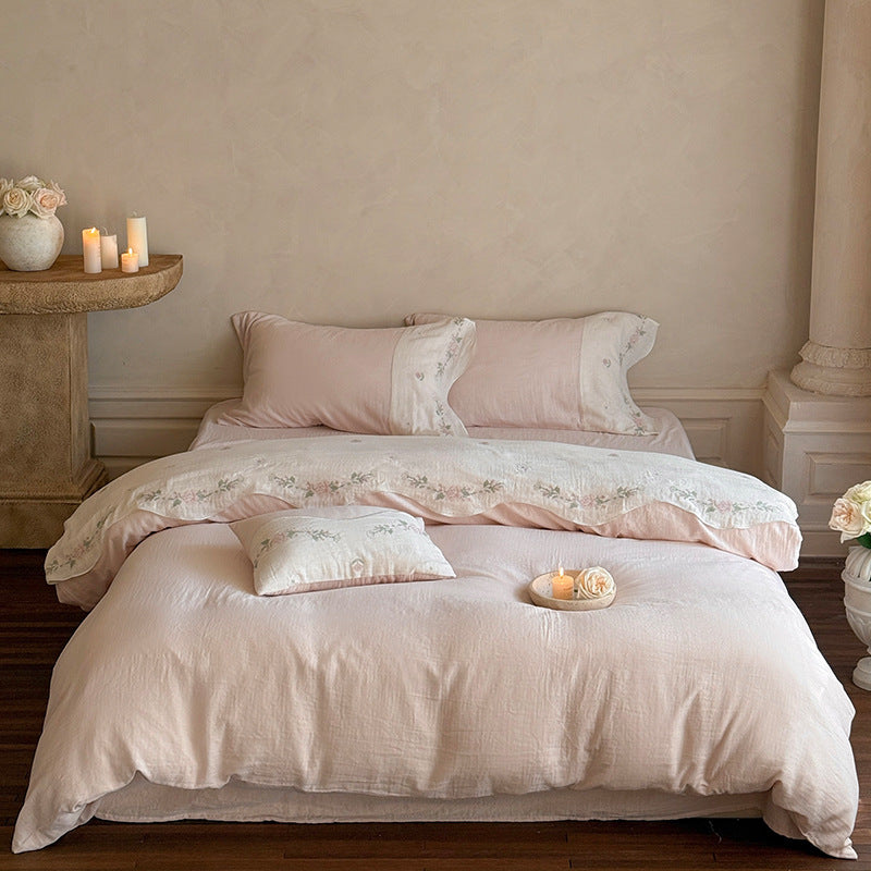 Bedding set made of washed linen with floral embroidery border