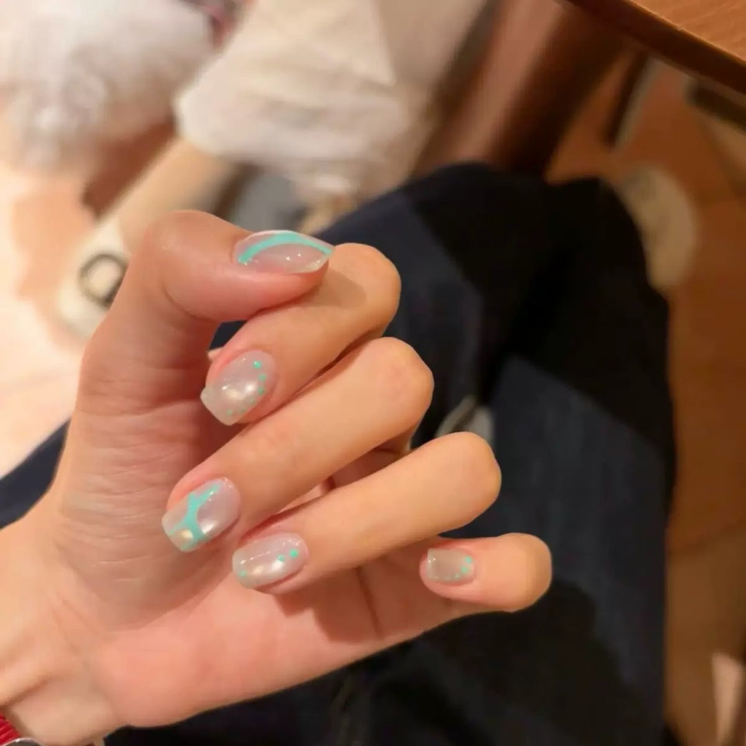 Artistic Press-On Nails with Geometric Patterns