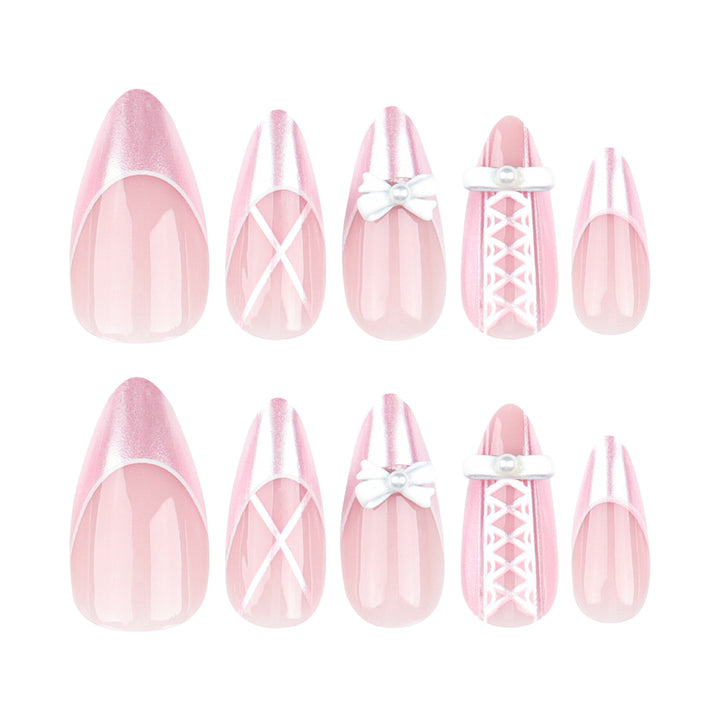 Artistic stiletto nails with elegant pearl and bow accents Kalsten