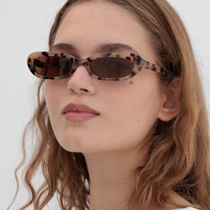 Women's trendy cat-eye sunglasses with transparent plastic frame and UV protection Kalsten