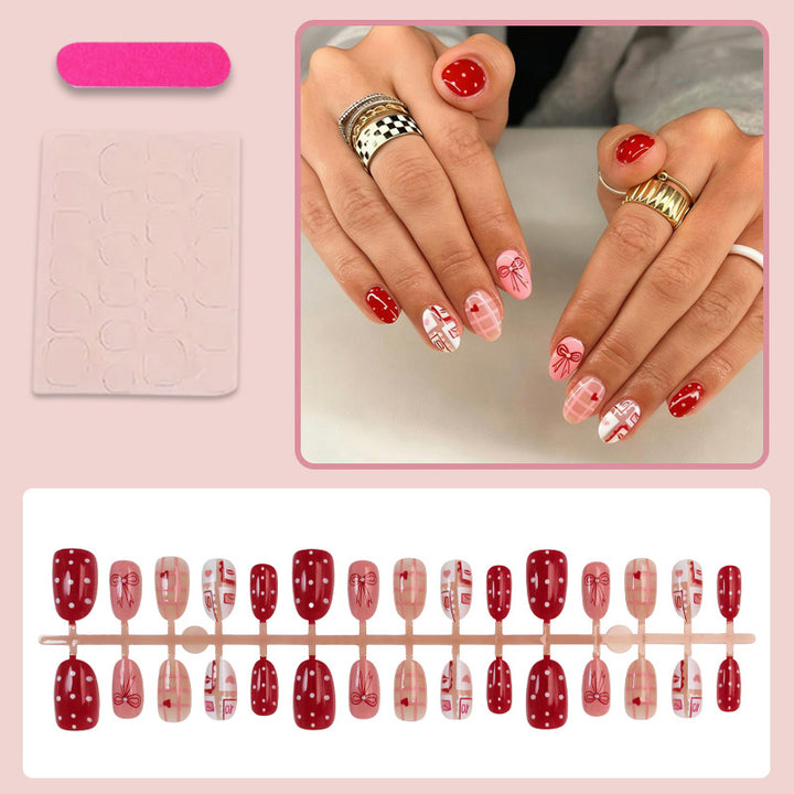Artificial nail set with charming heart and bow patterns Kalsten