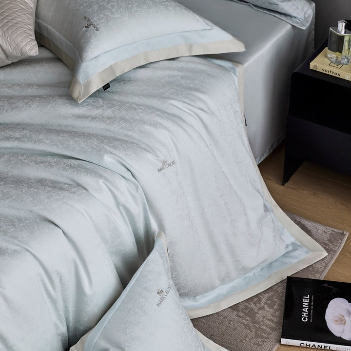 Premium cotton satin bedding set with subtle jacquard relief and fine hem