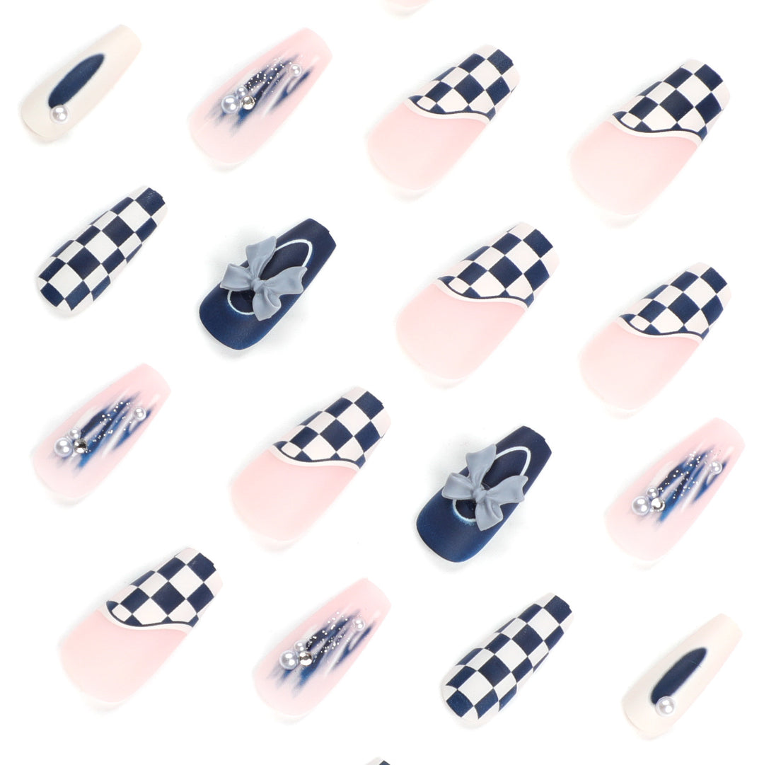 Artful nail decoration with bows and plaid pattern Kalsten
