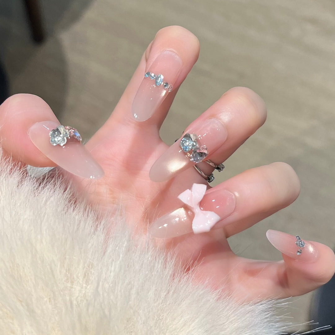 Elegant Nail Art Extensions with Pearl Accents Kalsten