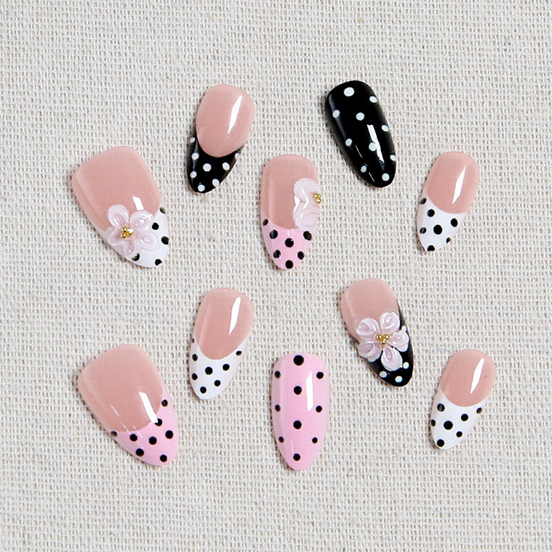 Nail art set with floral accents and elegant dots Kalsten