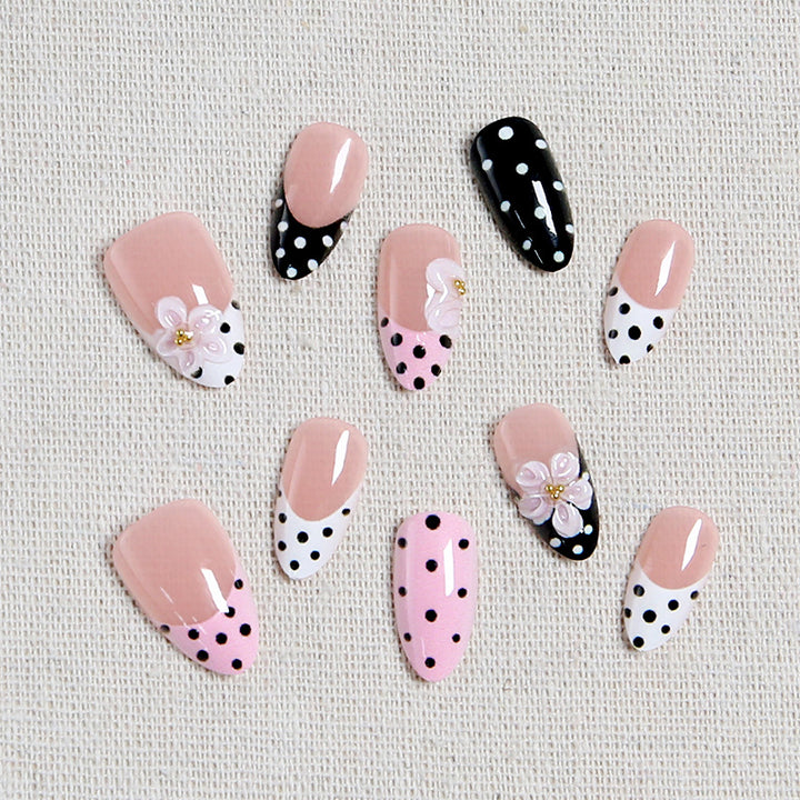 Nail art set with floral accents and elegant dots Kalsten