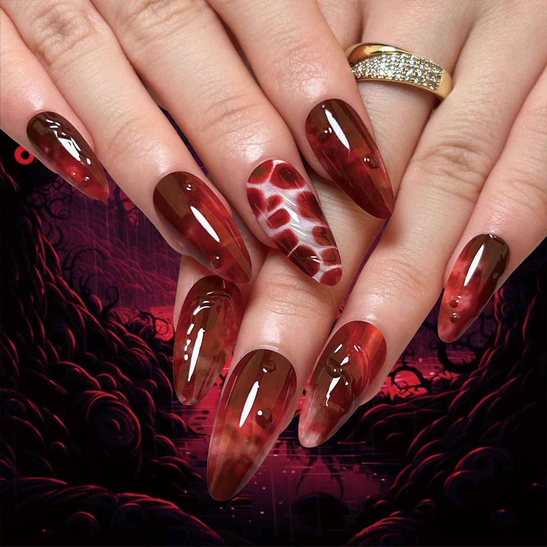 Creative Stiletto Nail Art with Blood Red Accents Kalsten
