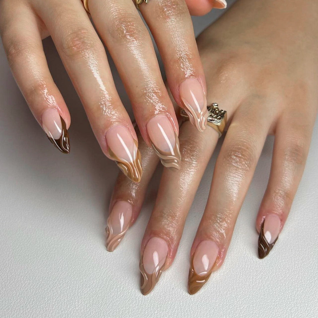 Artful stiletto nails with elegant gradient and glitter accents Kalsten
