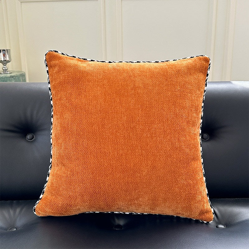 Decorative square decorative pillow made of soft velvet with contrasting piping