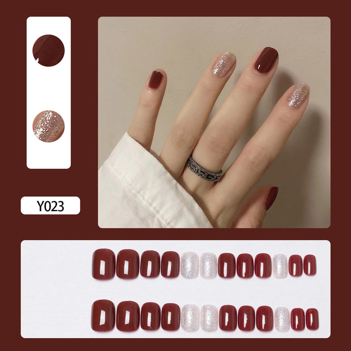 Artistic Press-On Nail Set with Heart and Leaf Designs