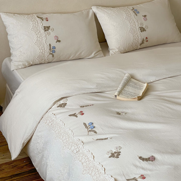 Embroidered cotton satin bedding set with lace trim
