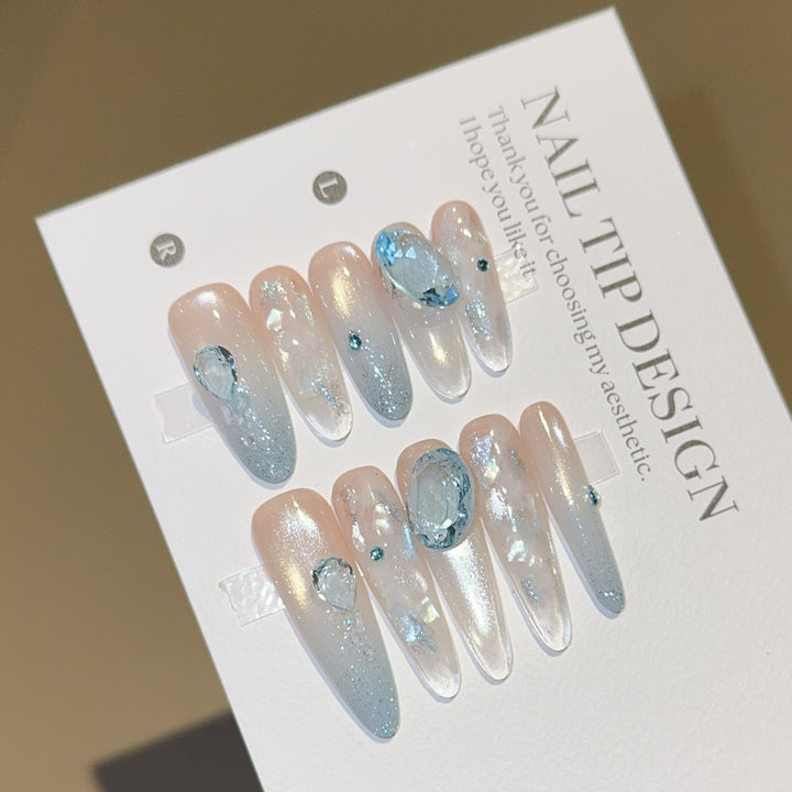 Artificial nails with rhinestones and glitter effects Kalsten