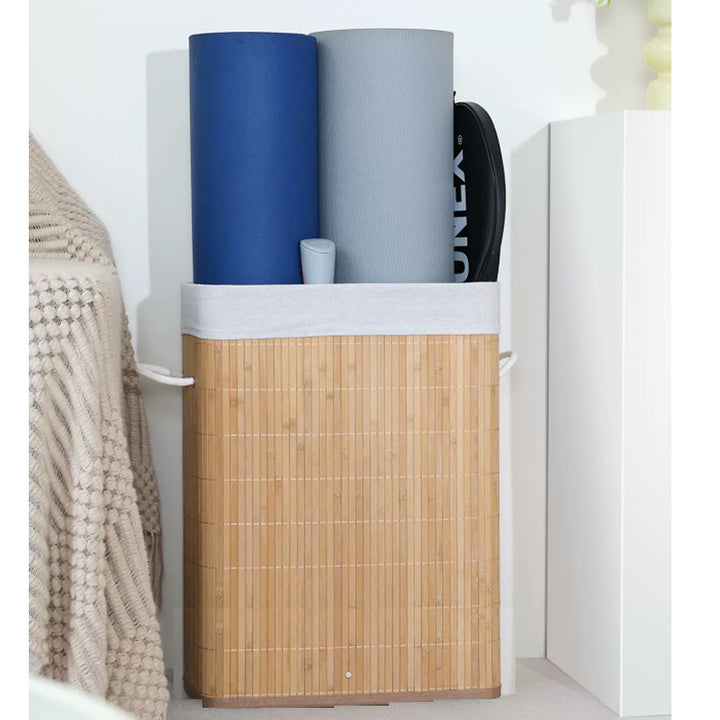 Stylish laundry container with practical lid and carrying handles Kalsten