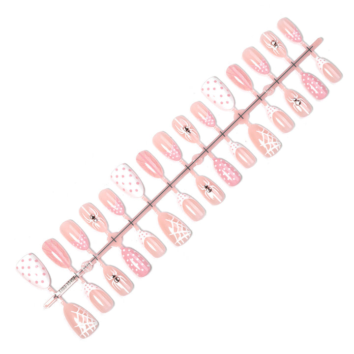 Artificial nail set with playful spider and polka dot motifs Kalsten