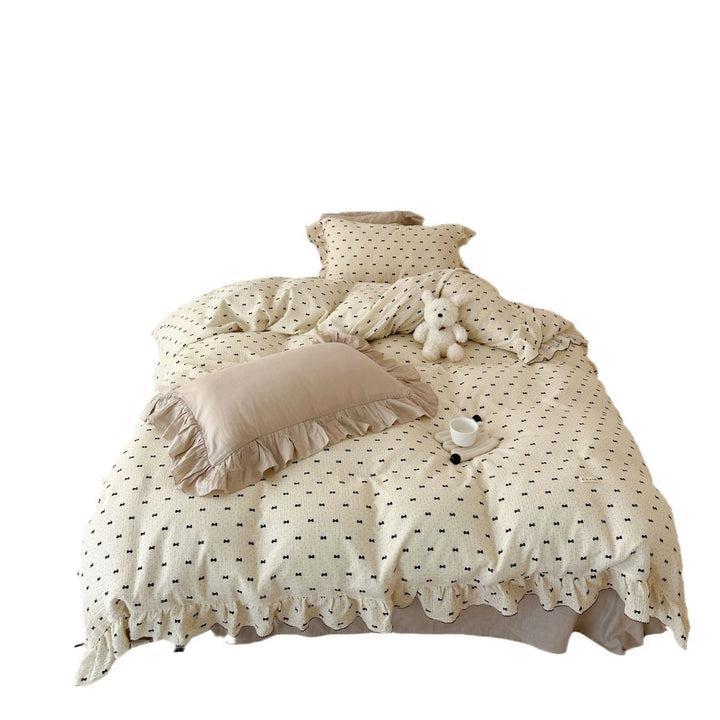 Bedding set made of cotton gauze with ruffled trim and fine bow print