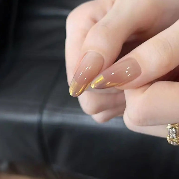 Nail art with elegant gradient and metallic accents Kalsten