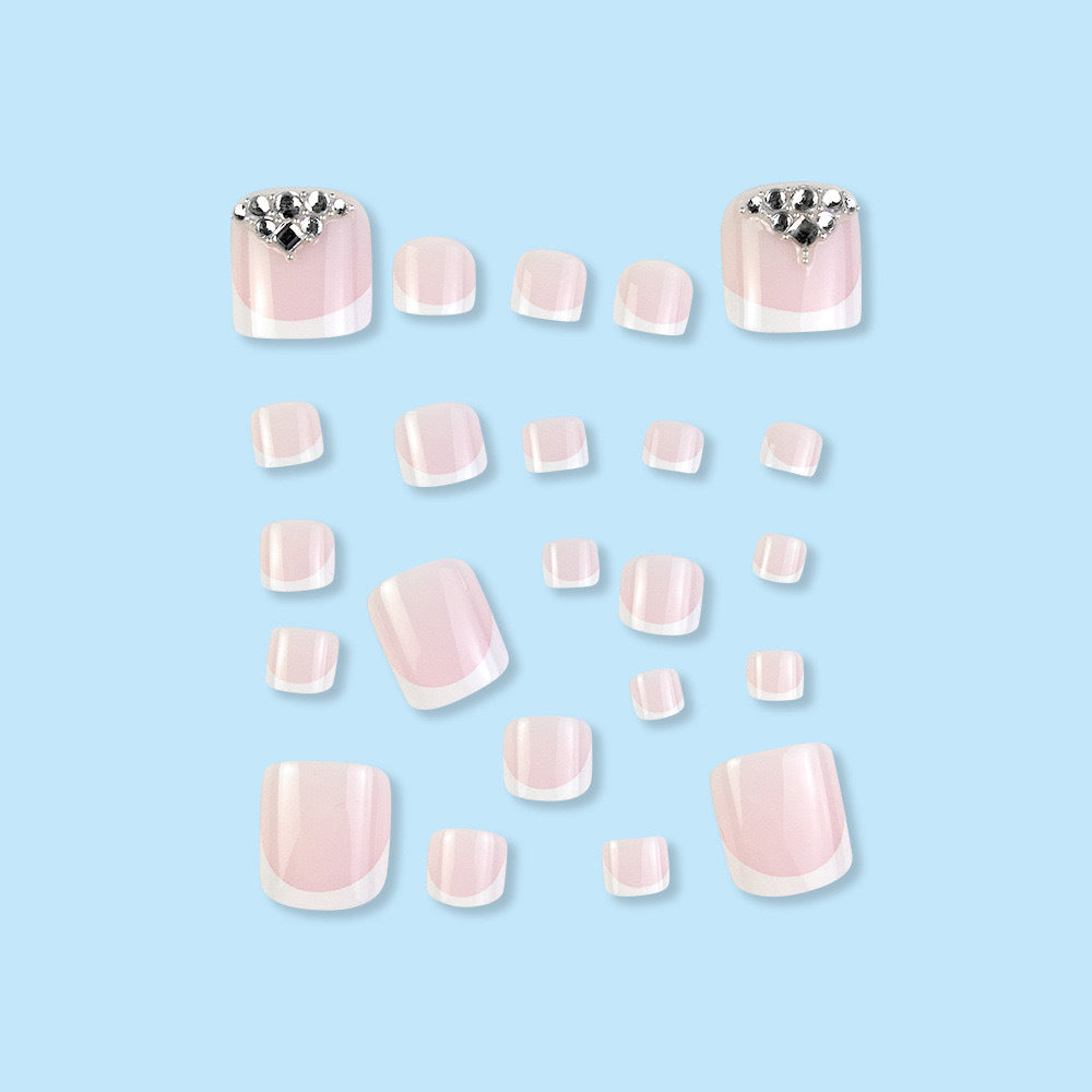 Nail art set with elegant French tips and sparkling rhinestone details Kalsten
