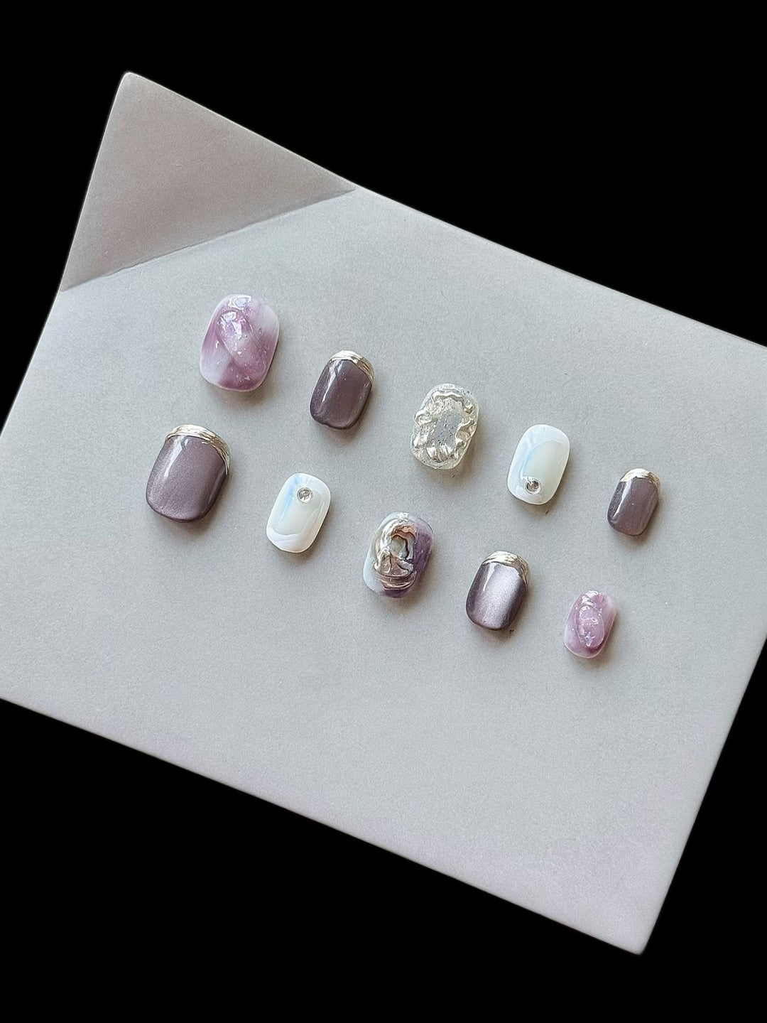Artistic Press-On Nail Art Set with Unique Ombre and Metallic Accents
