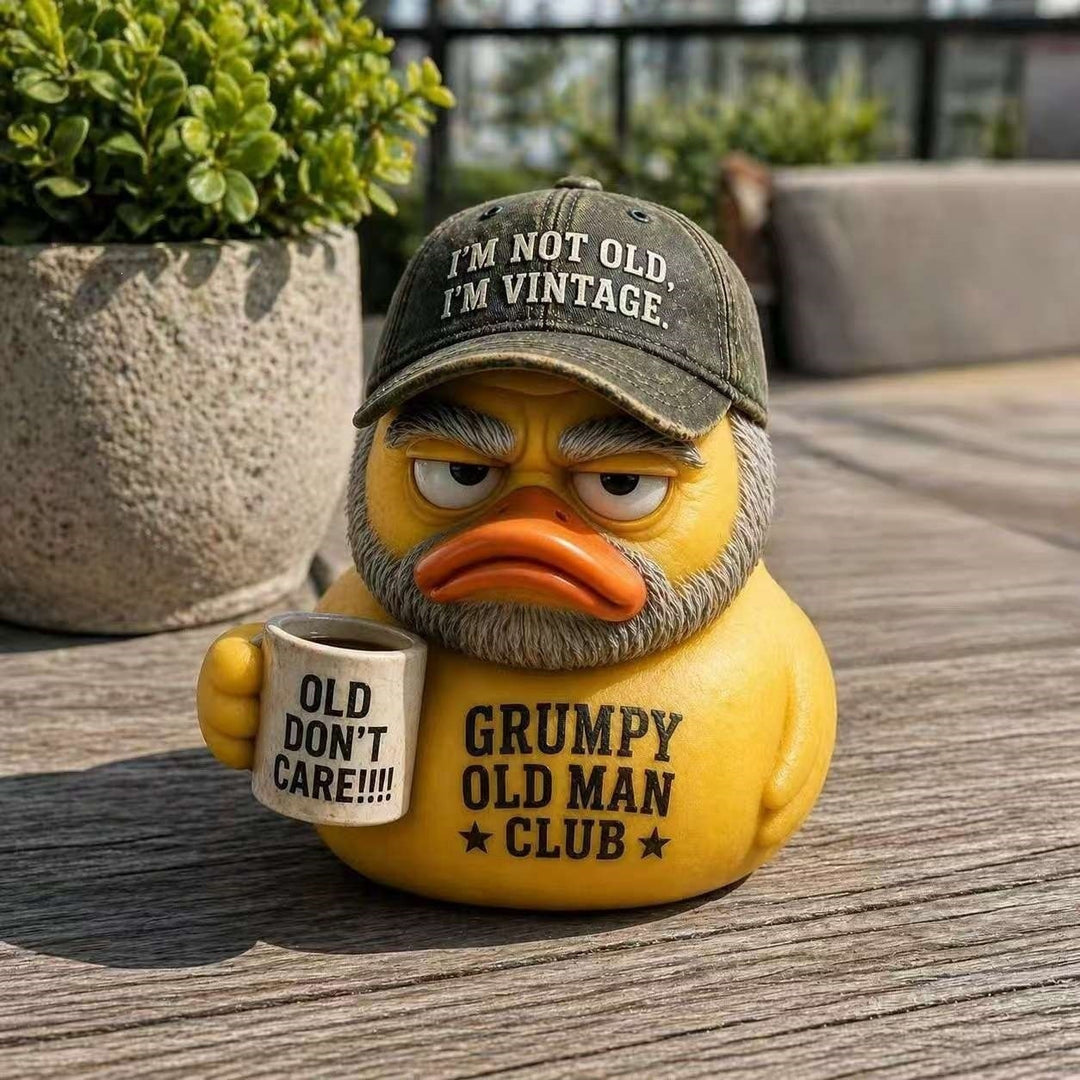 Funny rubber duck with vintage hat and cup Kalsten
