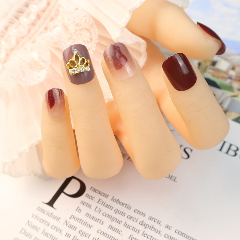 Decorative Press-On Nail Set with Elegant Crown Accents