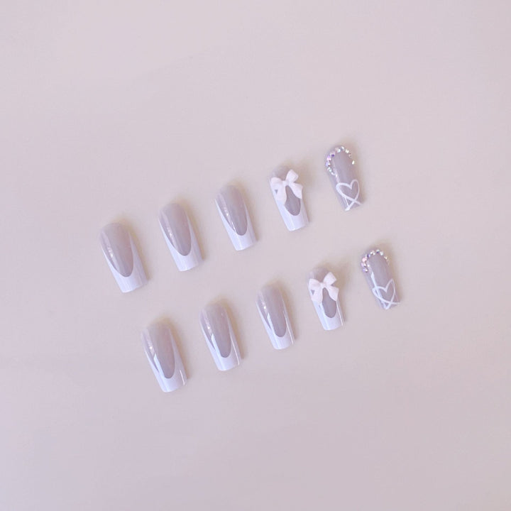 Artificial nail set with elegant bow and glitter decorations Kalsten