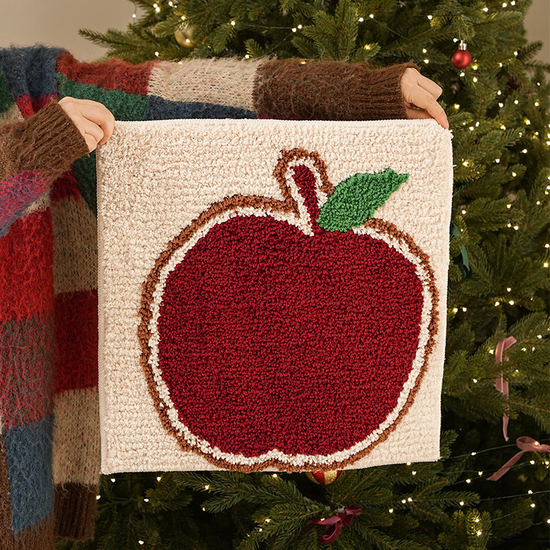 Tufted Christmas placemat with gingerbread house motif Kalsten