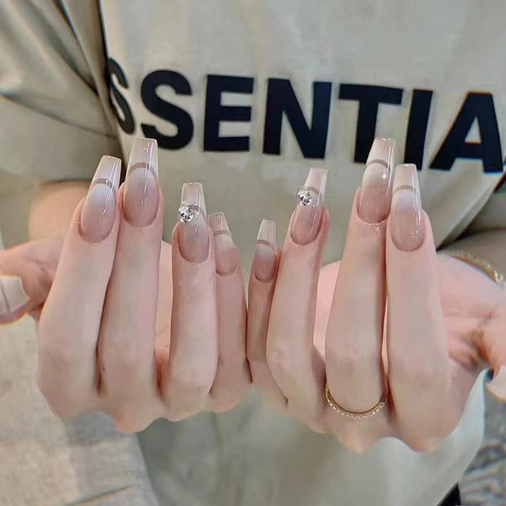 Glamorous artificial nails with elegant rhinestone decorations Kalsten