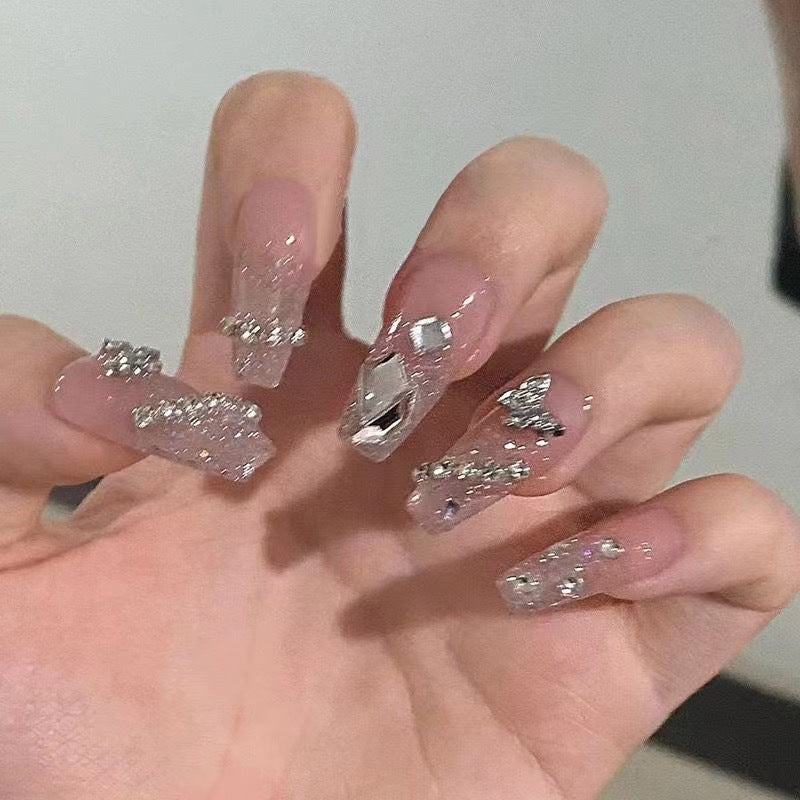 Elegant Nail Art with Glitter and Rhinestones Kalsten
