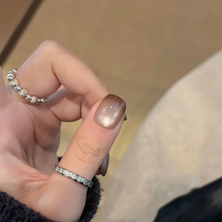 Artificial nails with elegant gradient color and glitter elements Kalsten