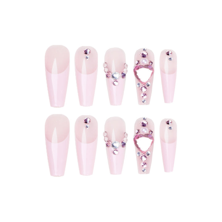 Glamorous nail extensions with glitter embellishments Kalsten