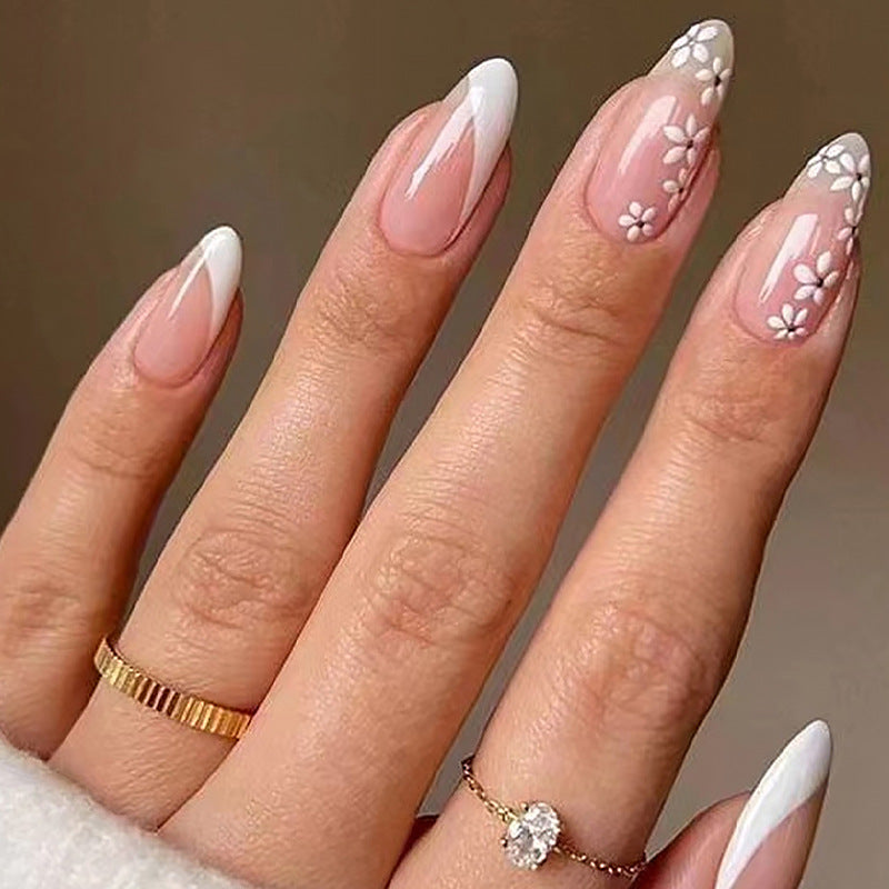 Artistic Nail Tips with Floral Accents Kalsten
