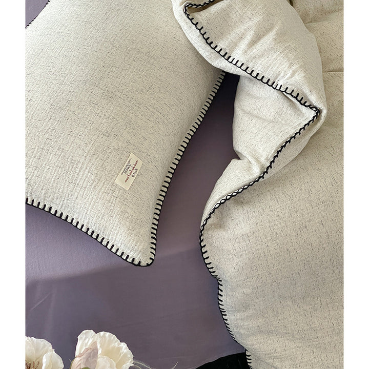 High-quality bedding set made of cotton-linen with fine texture and contrasting decorative seam