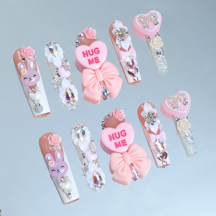 Creative nail art set with playful animal and heart motifs Kalsten
