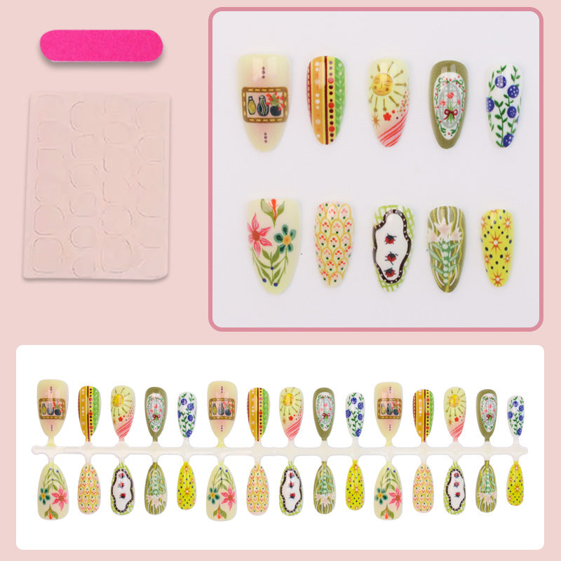 Nail art set with elaborate floral and colorful design Kalsten