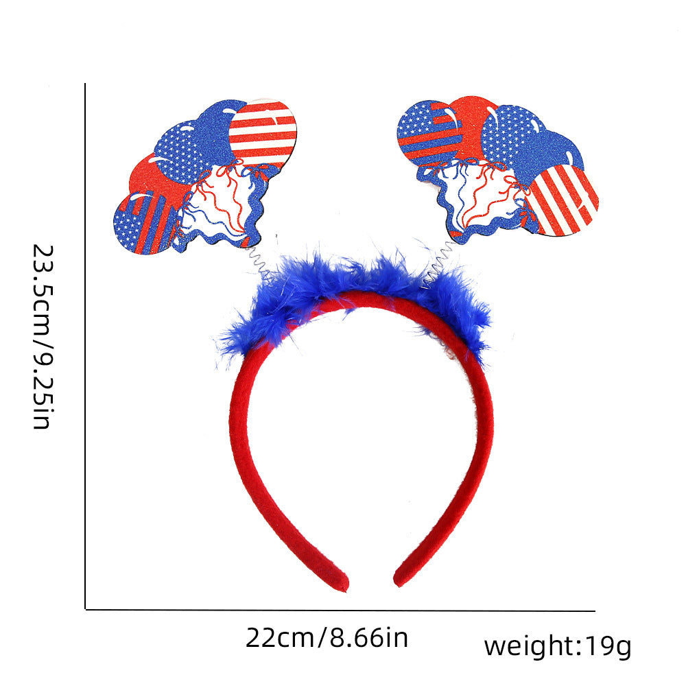 Ladies' festive hairband with pom poms, star embellishments, and glitter tinsel Kalsten