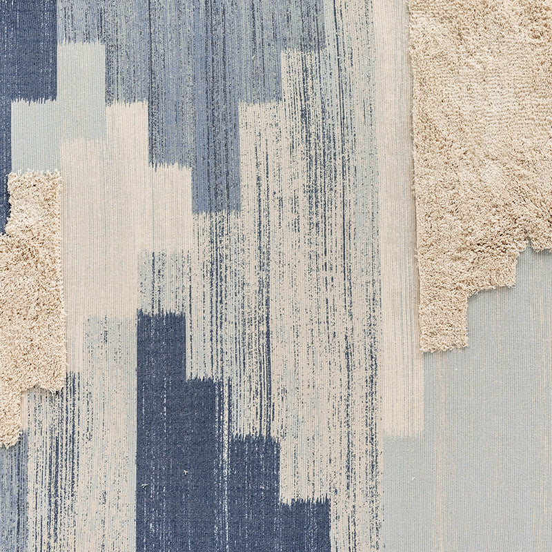 Modern woven living room rug with abstract structure and tufted high-pile accents Kalsten