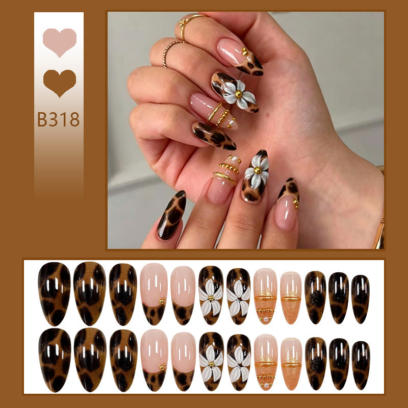 Nail set with elegant animal print and floral appliqués Kalsten