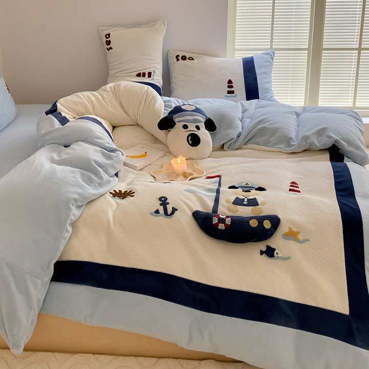Children's bedding set with quilted blanket, waffle texture and embroidered sea motif