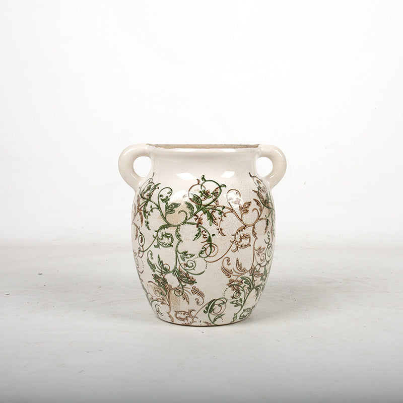 Decorative plant pot with floral accents Kalsten