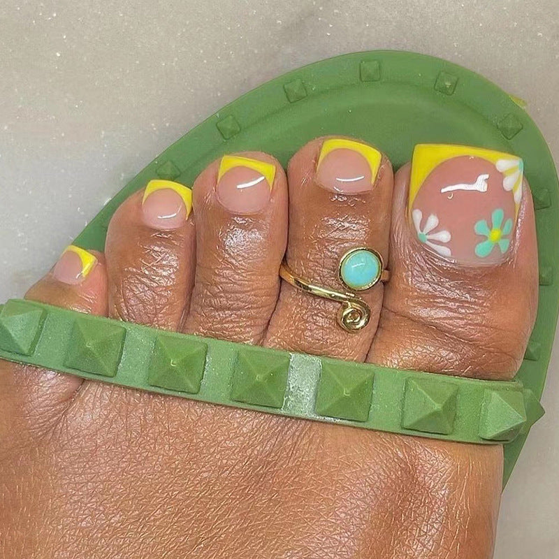 Creative toenail art with colorful flower accents Kalsten