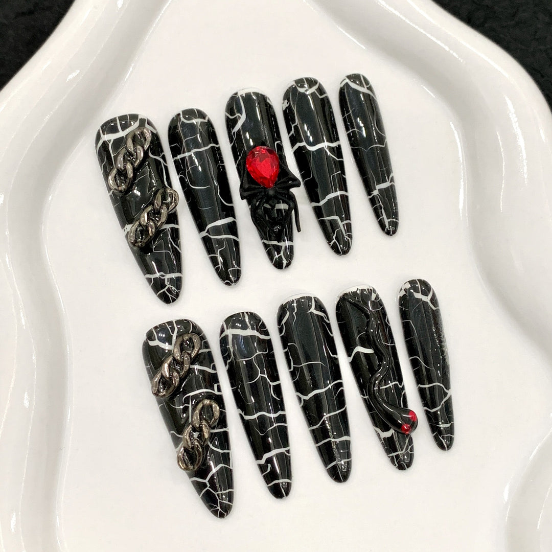 Artistic Press-On Nail Set with Modern Black Marble Design