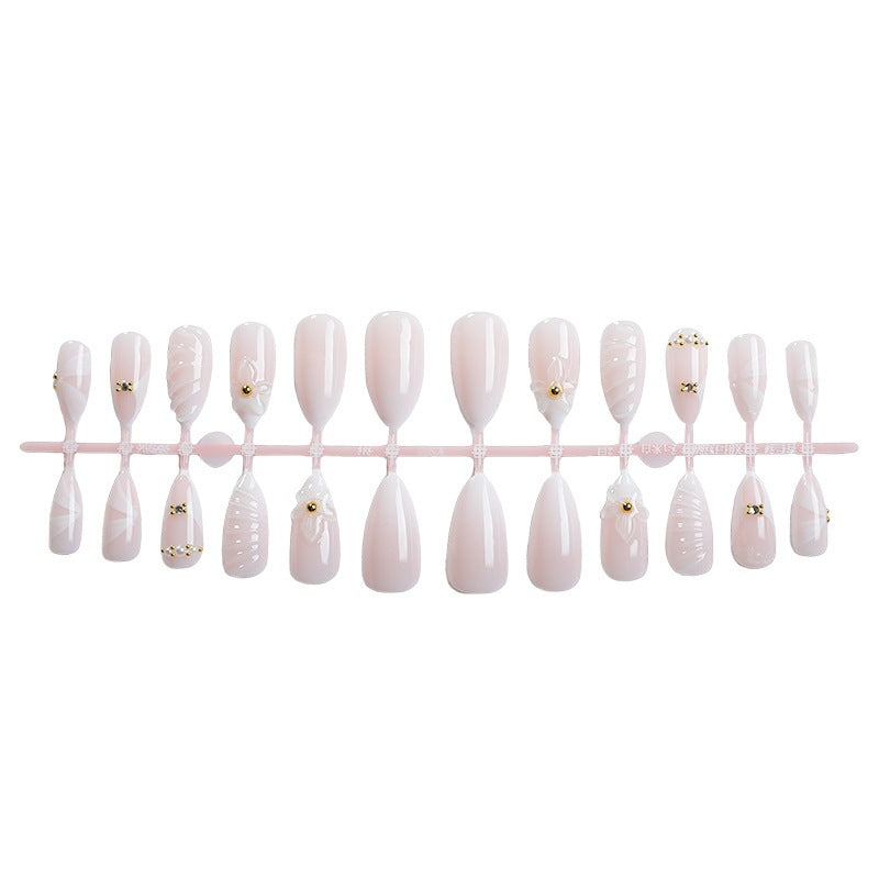 Artificial nail set with elegant floral design and luxurious accents Kalsten