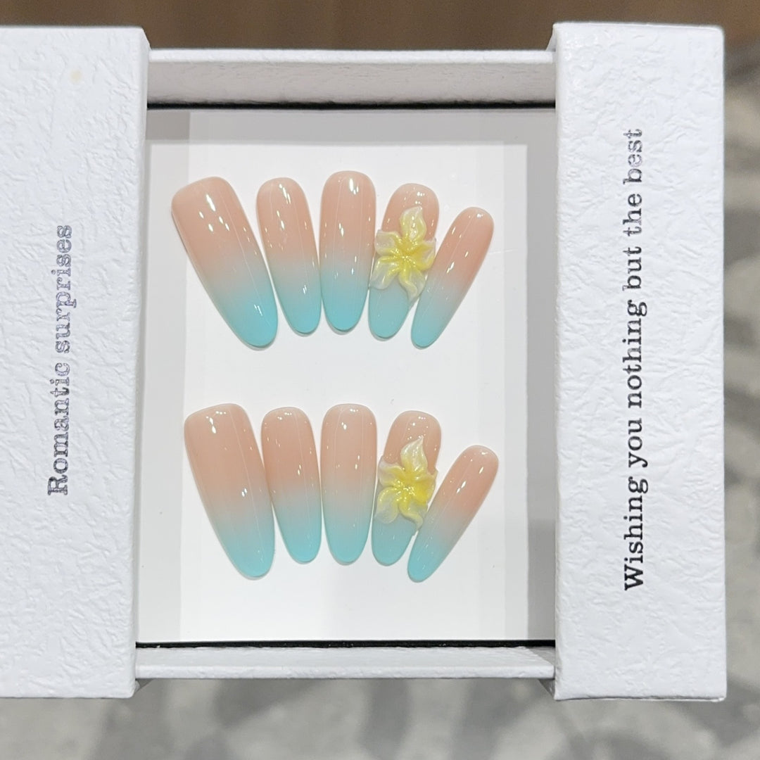 Artificial nails with enchanting ombre effect and floral accents Kalsten