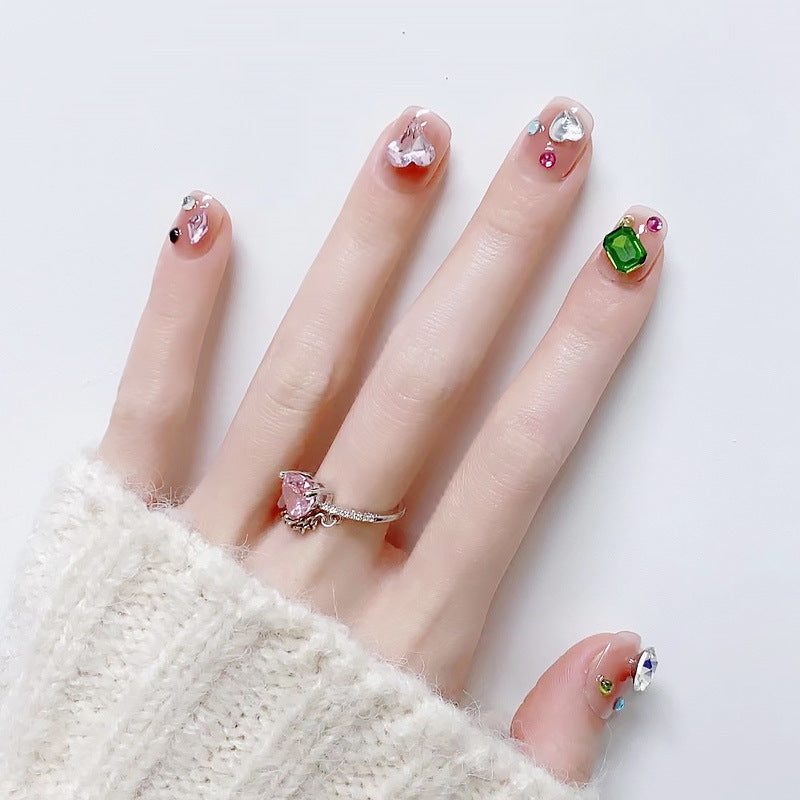 Acrylic nail set with sparkling 3D applications and beautiful heart designs Kalsten