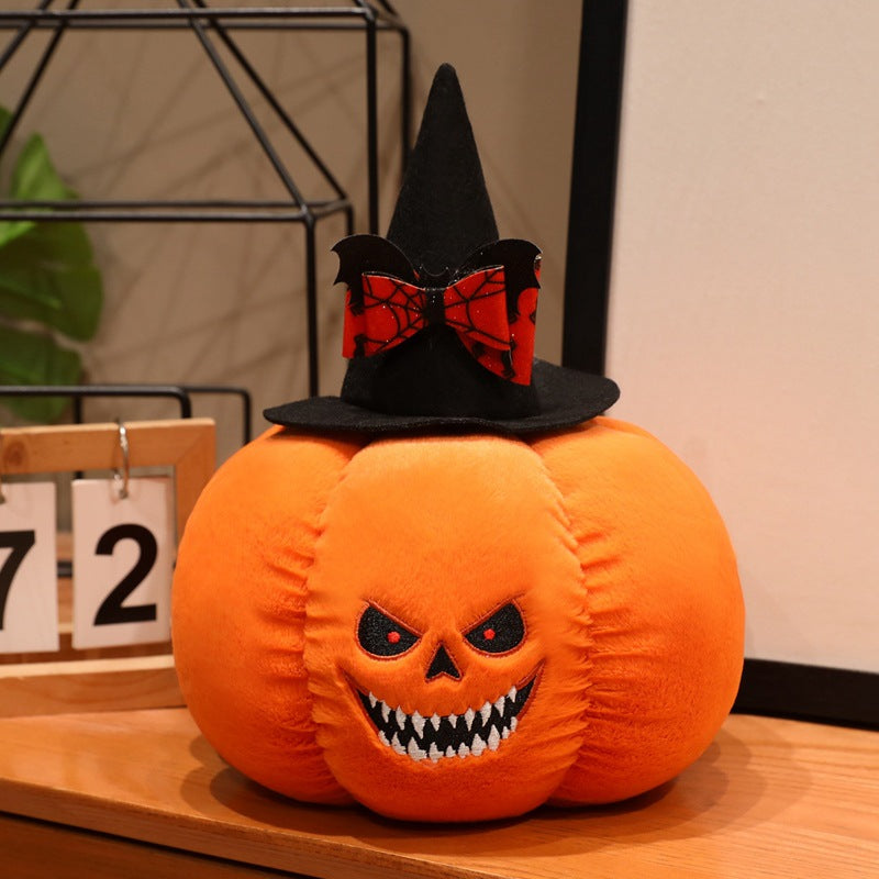 Plush pumpkin decoration figure with witch hat and embroidered spooky face