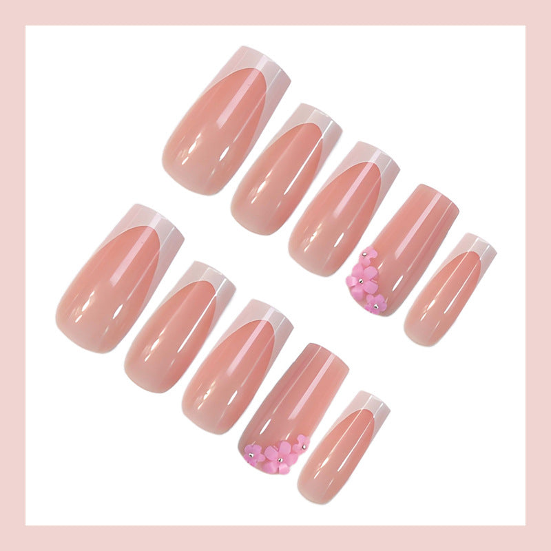 Acrylic nail set with elegant French tips and decorative accents Kalsten