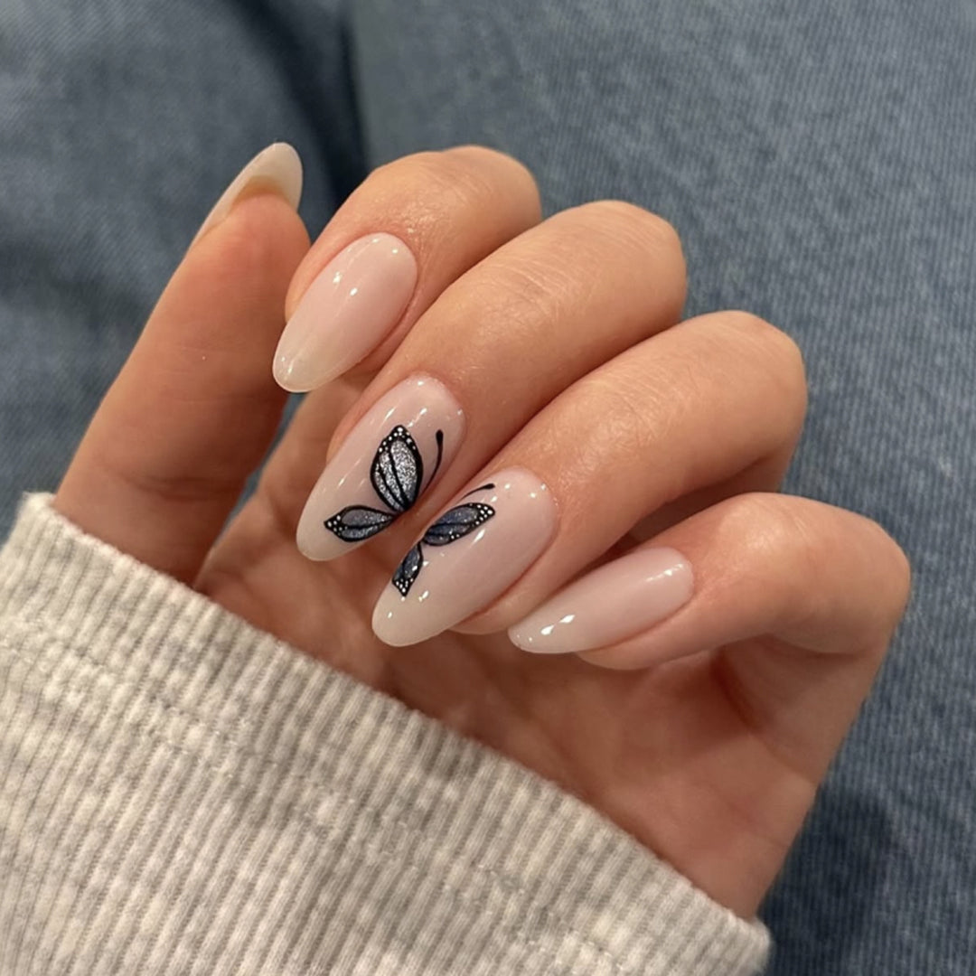Artful nail extensions with delicate butterfly design Kalsten