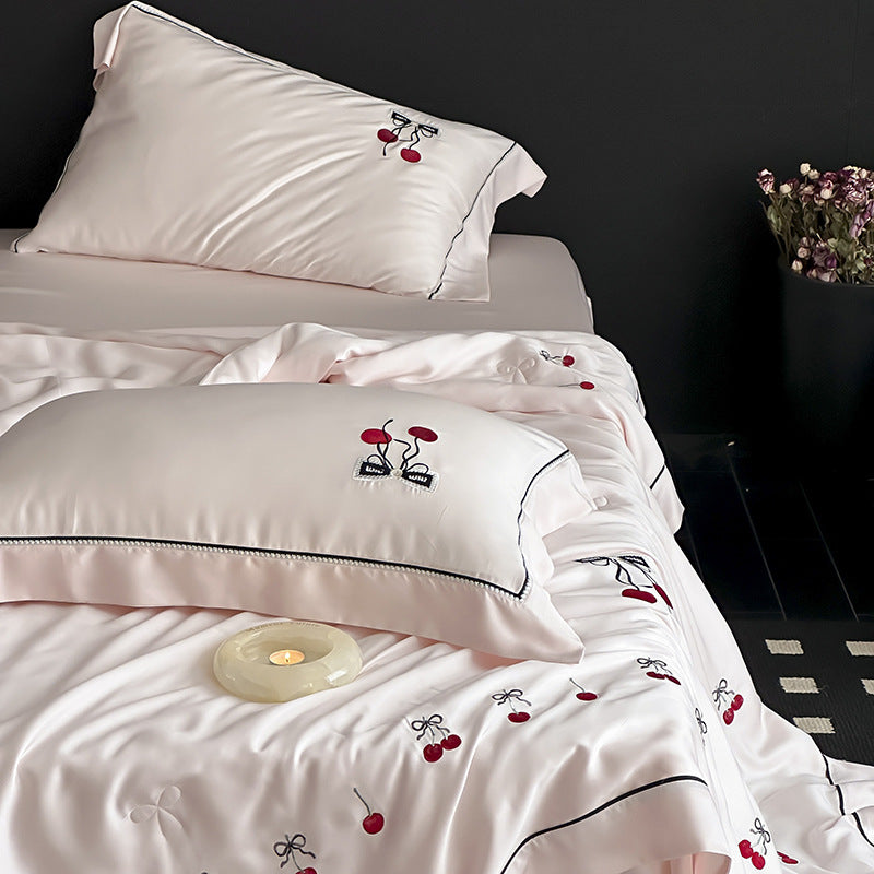 Cotton satin bedding set with cherry embroidery and contrasting piping