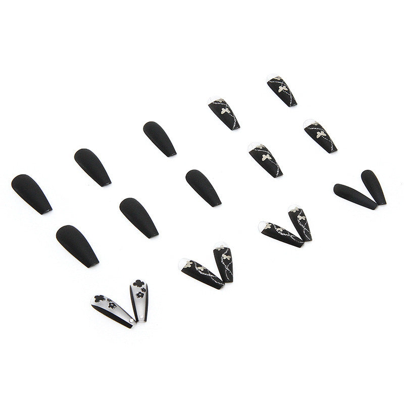 Art nail set with elegant butterfly and flower motifs Kalsten